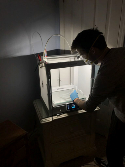 Makerspace employee and Foothill College student, Jon Armer, works on prototype of PPE headband